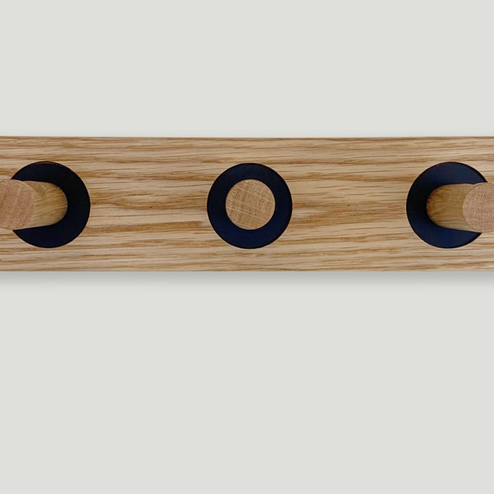 Oak coat rack - black inlays