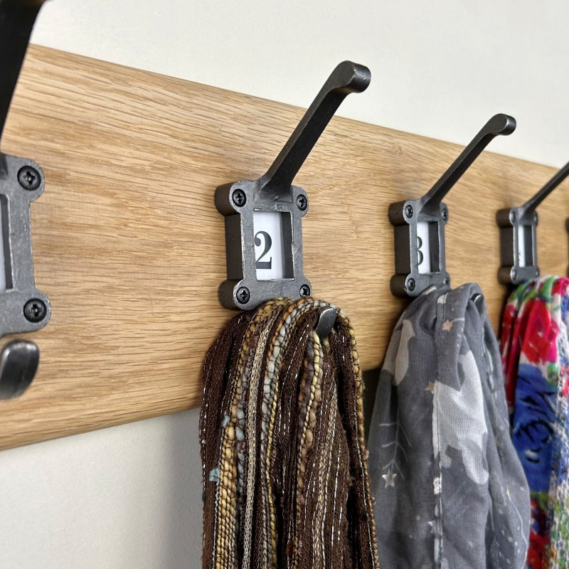 Solid oak coat rack - cast iron school style hooks