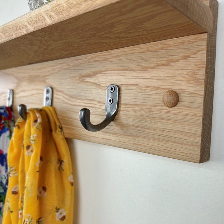Oak coat rack with integrated shelf - polished cast iron single hooks